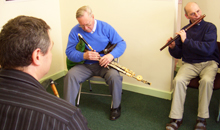 Martin Doyle playing an Irish traditional tune with pipers Ronan Browne and Seán McKiernan.